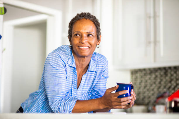 istock Senior Black Woman with Coffee 1058487190