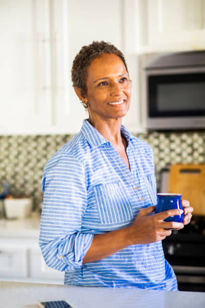 istock Senior Black Woman with Coffee 1058487304