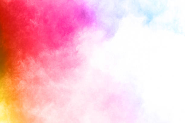 istock Colorful powder explosion on white background. Colored cloud. Colorful dust explode. Paint Holi. 1058487488