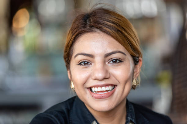 istock Smiling beautiful young woman 1058487526