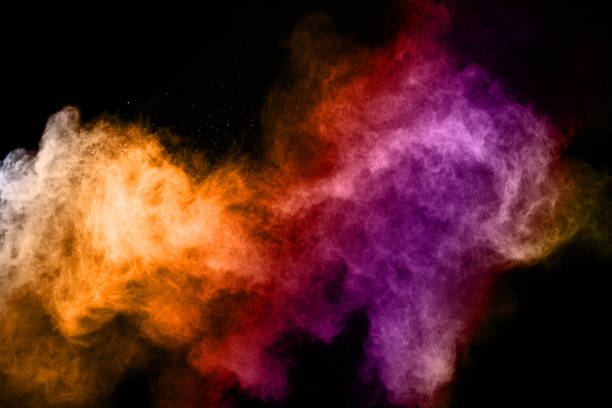 istock abstract colored dust explosion on a black background.abstract powder splatted background,Freeze motion of color powder exploding/throwing color powder, multicolored glitter texture. 1058487678