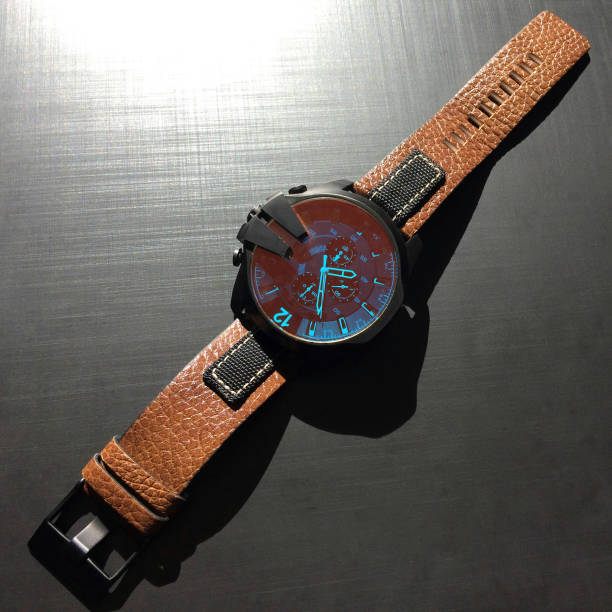 istock wrist watch with leather strap on a dark background 1058493948
