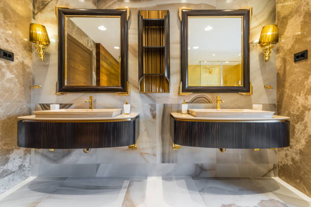 istock Two washbasins with lightening and mirrors in bathroom 1058494062