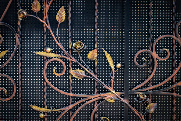 istock wrought-iron gates, ornamental forging, forged elements close-up 1058494520