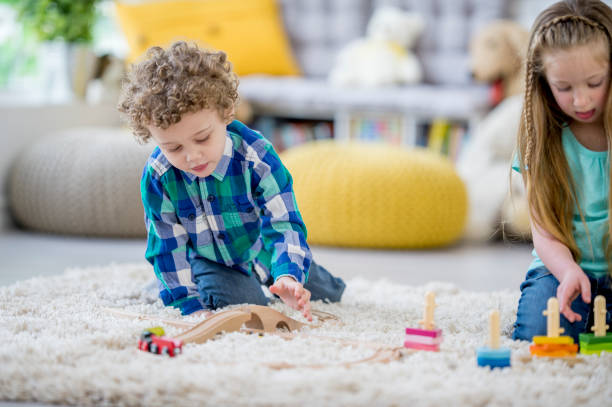 istock Boy And Girl Playing 1058504796