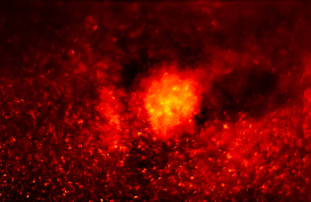 istock Abstract bokeh glitter background. Defocused background. Blurred bright light on black 1058505876