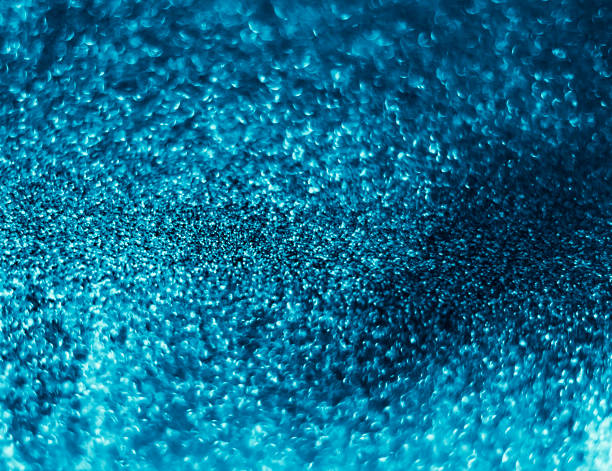 istock Abstract bokeh glitter background. Defocused background. Blurred bright light on black 1058506832