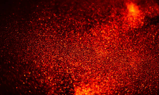 istock Abstract bokeh glitter background. Defocused background. Blurred bright light on black 1058507344