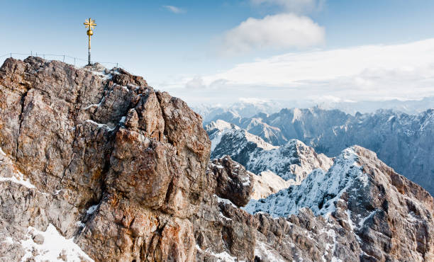 Sign on the top of Zugspitze mountain. Famous landmark in Bavaria. The highest mountain in Germany. Clear sunny day in highlands of the Alps. Snow peaks of the mountains. Sign on Zugspitze zugspitze mountain stock pictures, royalty-free photos & images