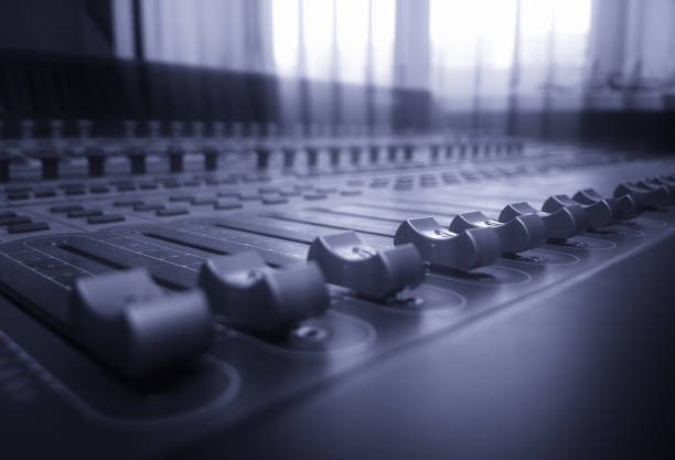 Studio mixer audio interface bokeh background stock photo