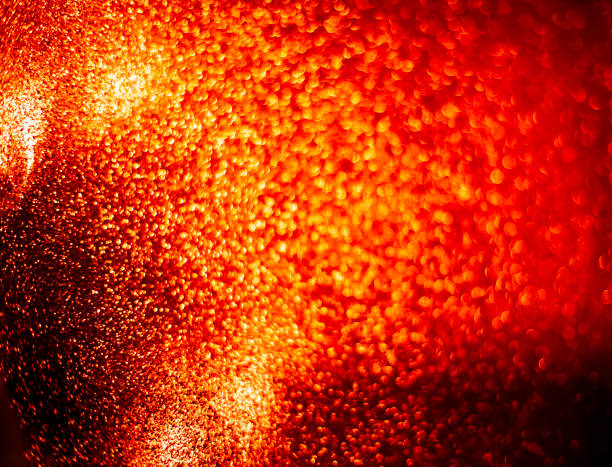 istock Abstract bokeh glitter background. Defocused background. Blurred bright light on black 1058510964