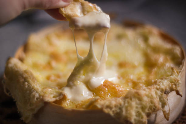 istock Cheese Fondue Dip Melt 1058511558
