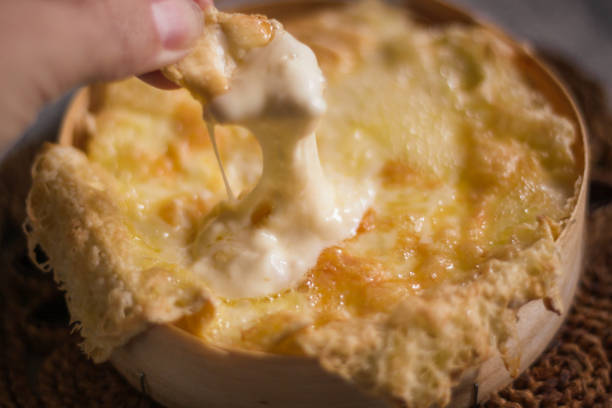 istock Cheese Fondue Dip Melt 1058511574