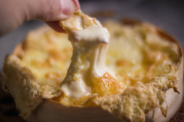 istock Cheese Fondue Dip Melt 1058511578
