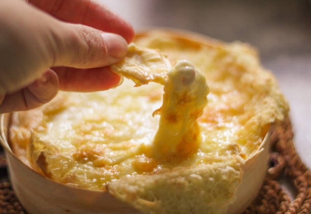 istock Cheese Fondue Dip Melt 1058511584