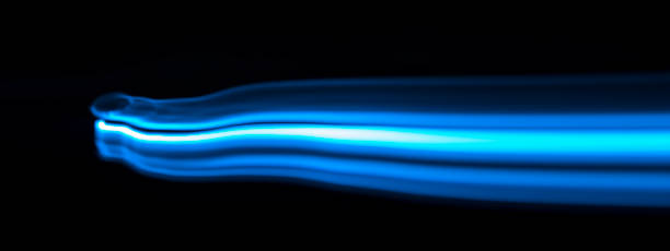 blue and white streaks of light - blue streak lights imagens e fotografias de stock