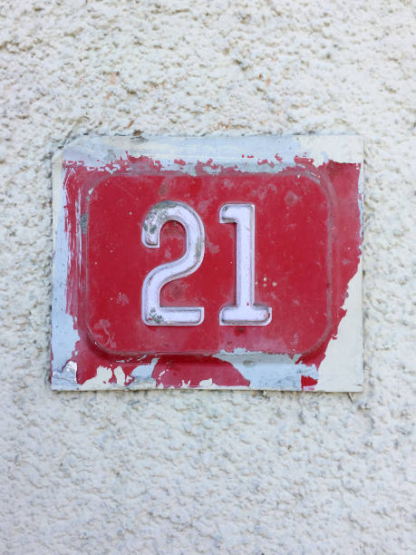 istock Old door number hanging on wall 1058515546