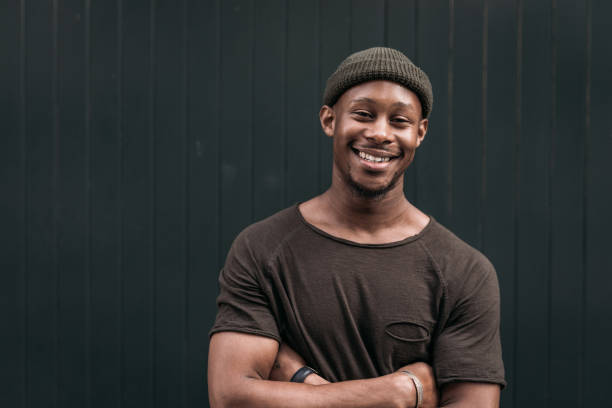 istock Young African man in casual clothing with cap 1058516638