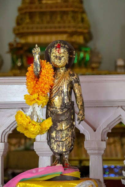 istock Statue of Buddha placed inside Royal Thai Monastery in Lumbini, Nepal 1058521036