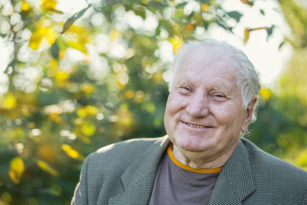 istock portrait of  elderly man in  park 1058522298