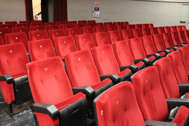 istock Red chairs of the theater audience 1058523554