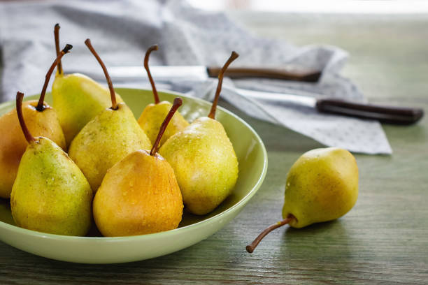 istock Yellow pears in a bowl. 1058524584