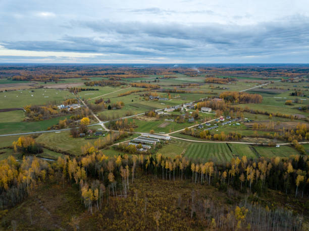istock drone image. aerial view of rural area with fields and forests covered in mist 1058525084