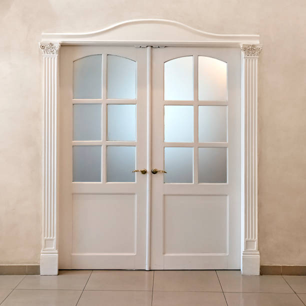 istock white double-leafed door of classical design 1058525596