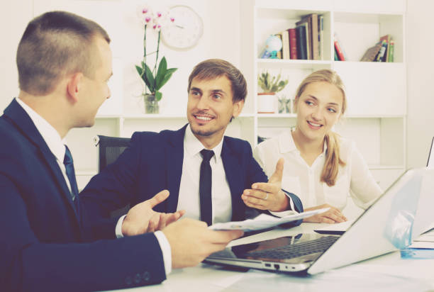 istock Business colleagues with document in hands 1058528988