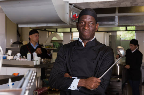 istock African-American chef in kitchen of restaurant 1058540330
