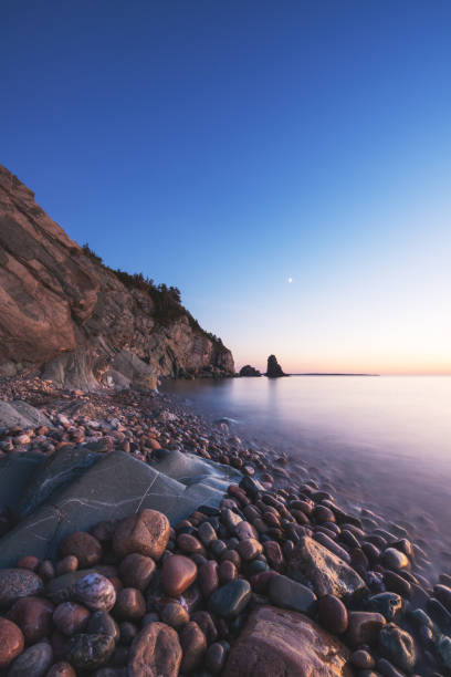 Rock formation ocean seascape sunset
