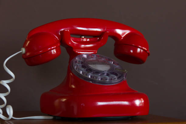 istock Retro style red telephone 1058547320