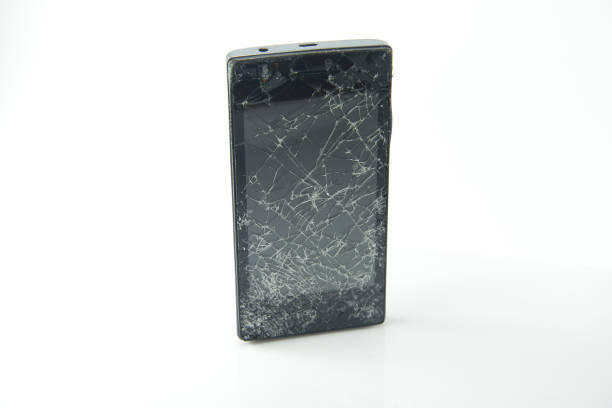 istock Smartphone drop to the floor and screen damage broken, broken smartphone on white background. 1058549920