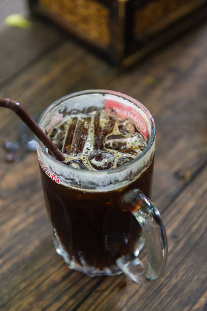 istock Ice black Coffee on the  table in the cafe. 1058551994