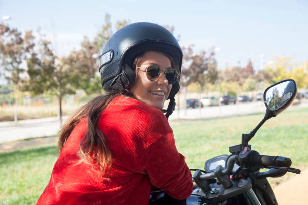 istock Young motorbiker girl 1058562812