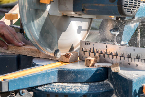 istock Roof construction building. Work on circular saw. 1058564850
