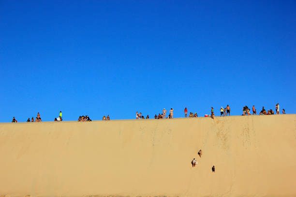 Dune of Pilat, France - September 10,2018: People on the Dune of Pilat, the tallest sand dune in Europe. La Teste-de-Buch, Arcachon Bay, Aquitaine, France