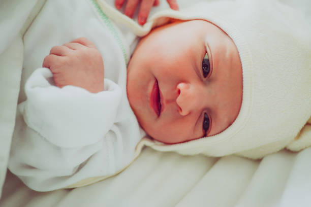 istock Sweet Baby in White 1058581400