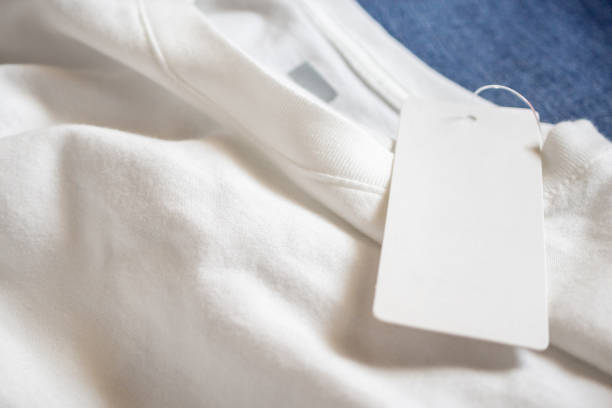 istock Blank price tag label on white t-shirt 1058581606