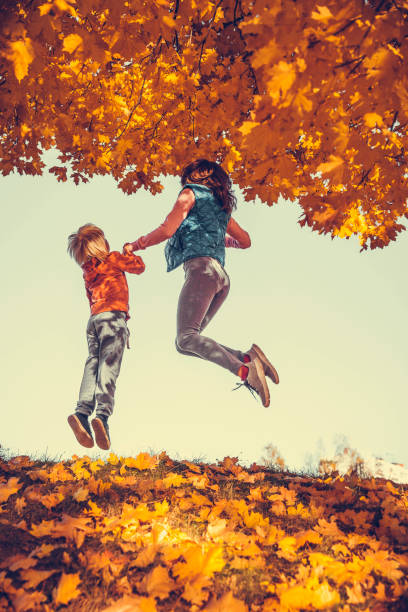 istock Mother and child in the park 1058584124