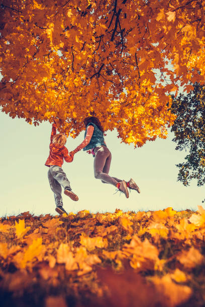 istock Mother and child in the park 1058584140