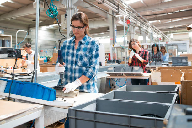 istock Concentrated workers on production line 1058586570