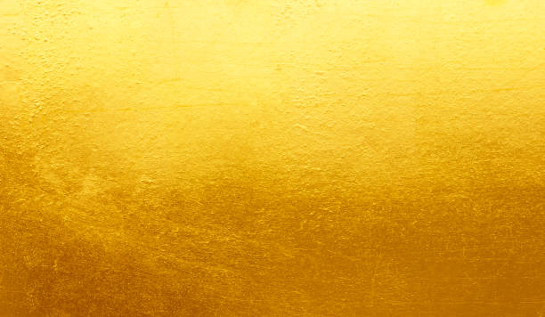 istock Shiny yellow leaf gold foi 1058588092