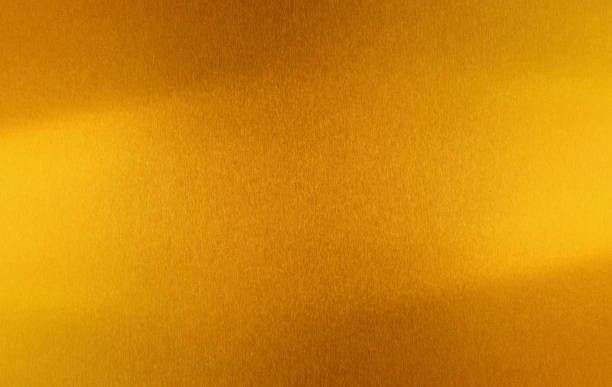 istock Shiny yellow leaf gold foi 1058588396