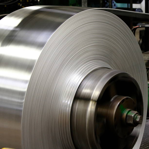 istock Aluminum ve steel sheet coils. 1058590146
