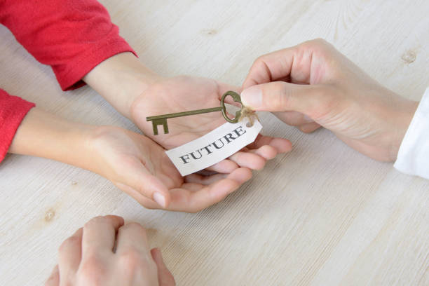 istock Key with future tag given from parent to child 1058596928