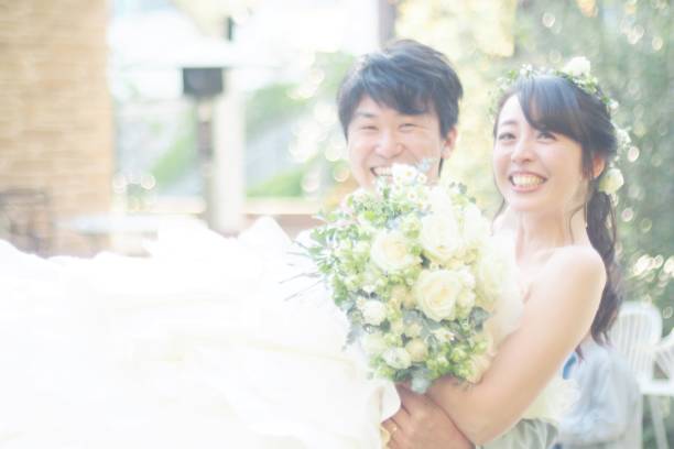 istock Happy bride and groom 1058602318