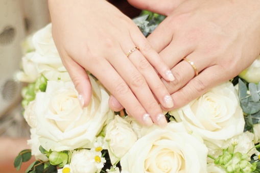 The hands of the bride and groom in Japan