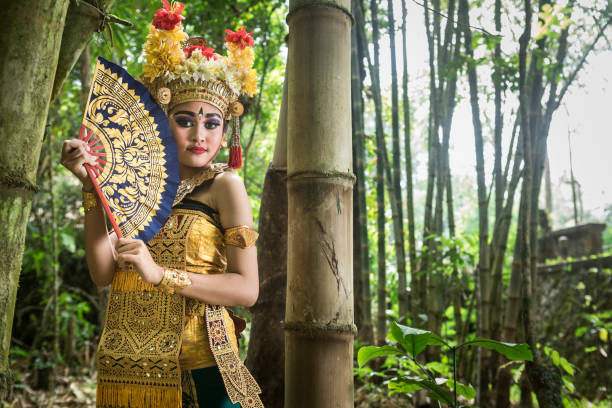 istock Portrait of a young Bali dancer in a bamboo forest 1058608882