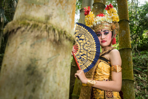 istock Portrait of a young Bali dancer in a bamboo forest 1058609048